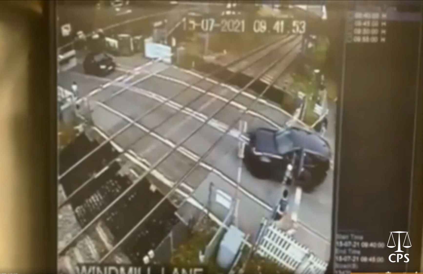 Land Rover drives through level crossing barriers