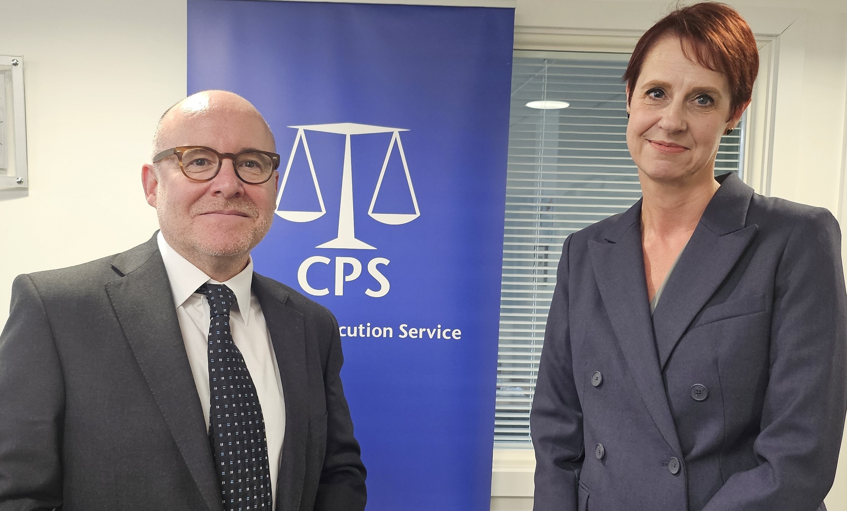 The attorney general with the Chief Crown Prosecutor of CPS Mersey Cheshire